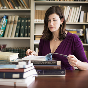 Person reading a book.