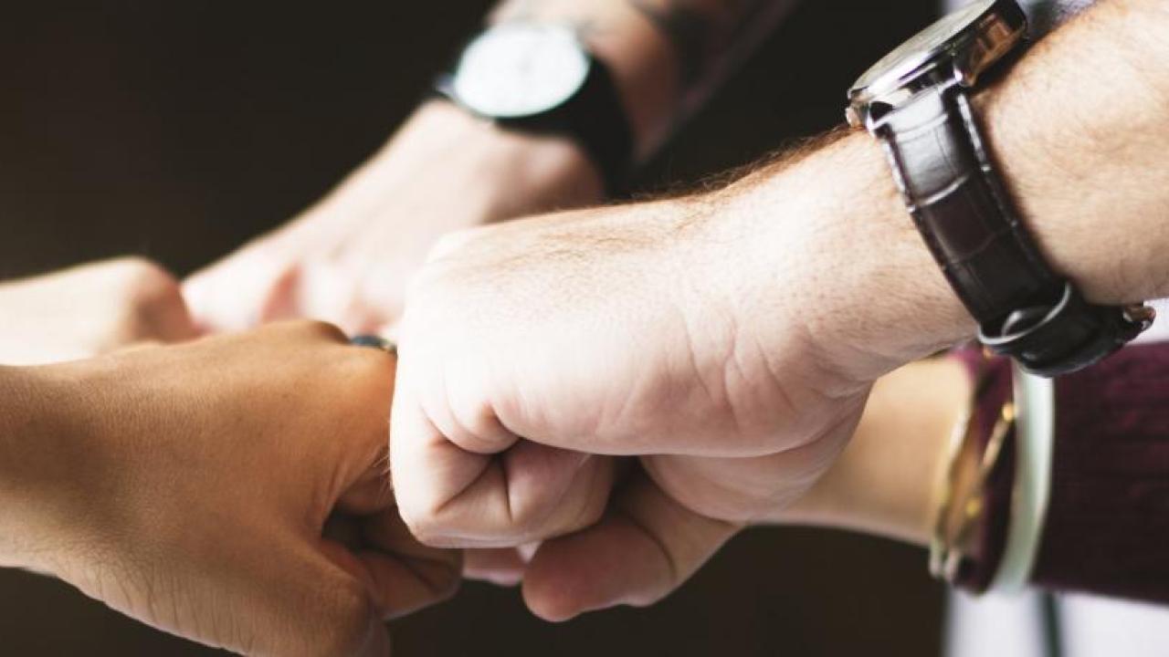 group fist bump