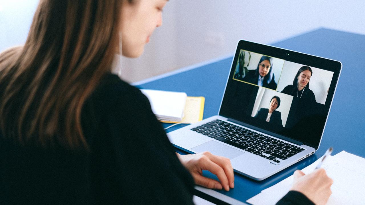 woman on her laptop on a zoom call