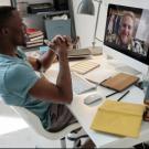 employee talking on computer desktop